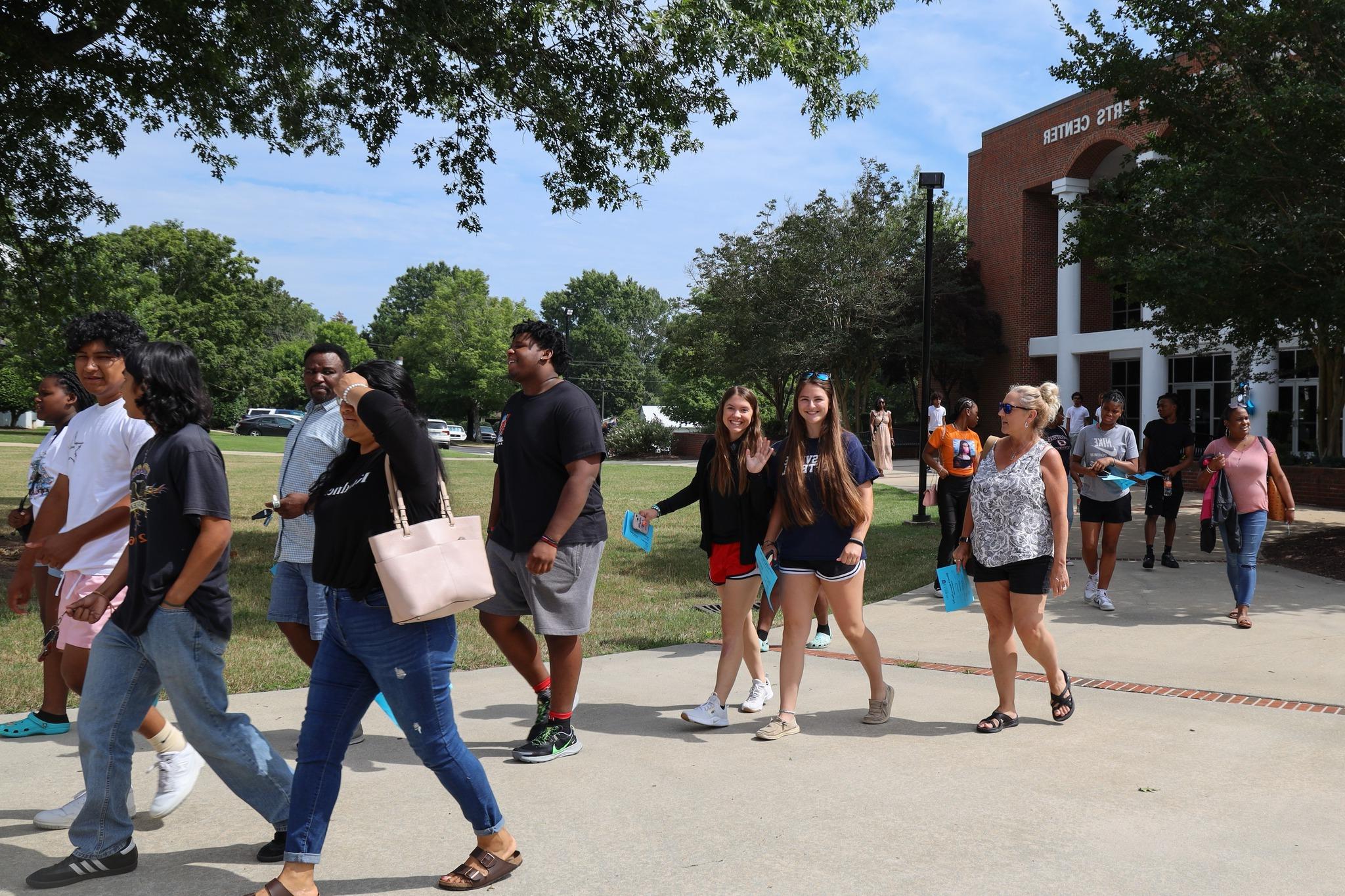 Prospective students walking to Taft building during Hurricane Prep Day.